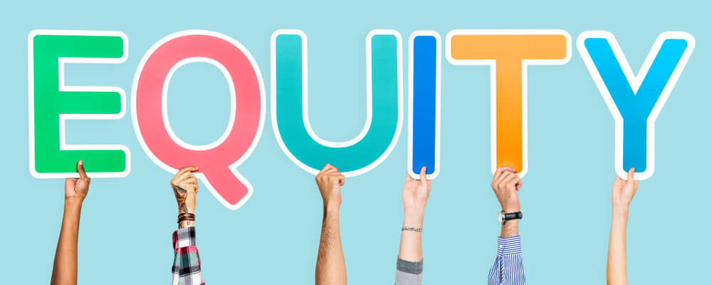 A blue sign with six hands each holding up different colored letters that spell "EQUITY", illustration of how home insurance protects your home's equity.