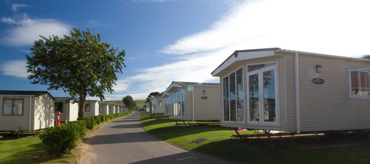 Photography of several mobile homes.