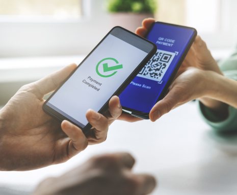 qr code payment - person paying with mobile phone – cheap car insurance in Georgia