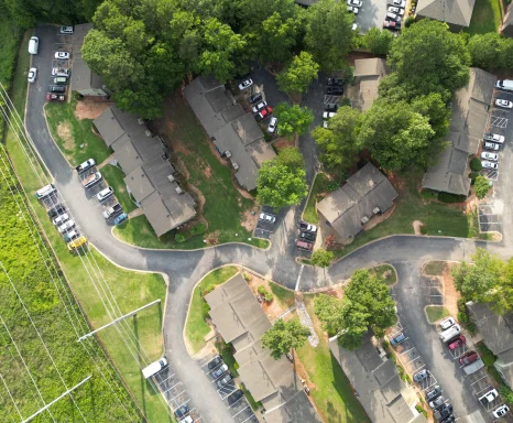 An aerial shot of the buildings and streets of Atlanta, Norcross: Cheap car insurance in Calhoun, Georgia.